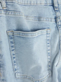 Korte Jeans Met Wijd Uitlopende Pijpen