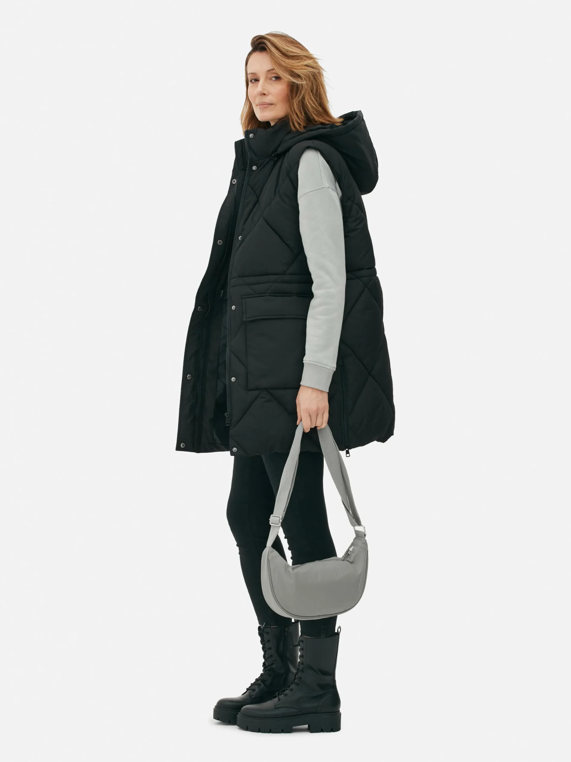 Lange Pufferbodywarmer Met Capuchon