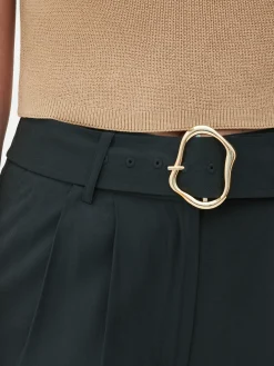 Matchende Broek Met Wijde Pijpen En Gesp