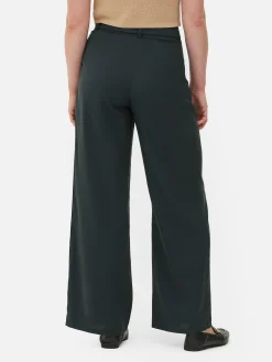 Matchende Broek Met Wijde Pijpen En Gesp